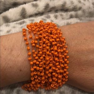 3/$20 Orange beaded adjustable bracelet